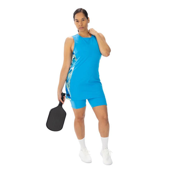 Aqua, pickleball racerback tunic with cool toned marble side panels and aqua 6 inch inseam performance shorts 