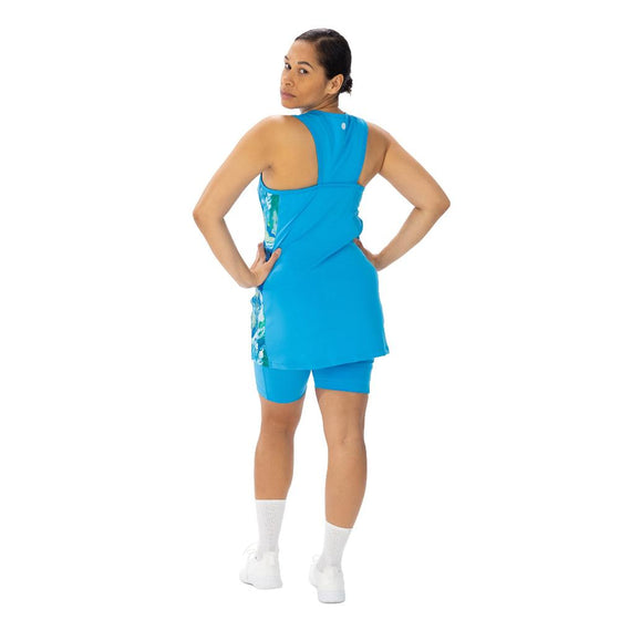 Aqua, pickleball racerback tunic with cool toned marble side panels and pickleball logo below back of collar, aqua 6 inch inseam performance shorts 