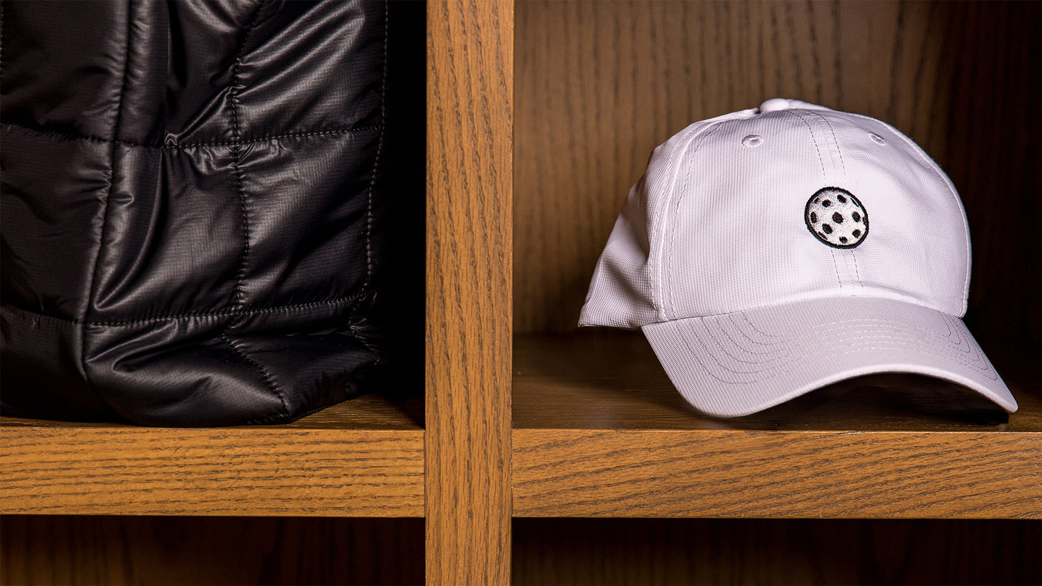 Saltie Rose Pickleball white hat with pickleball. 