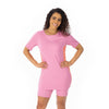 Heather Pink short sleeved pickleball tunic with pink and mango striped side panels, pink nine inch inseam, pickleball shorts