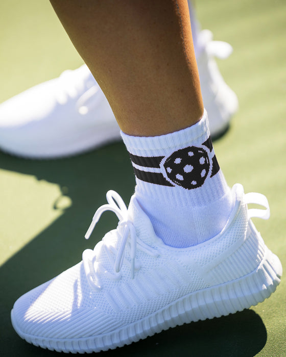 White crew socks with charcoal stripe and pickleball detail and charcoal at toe